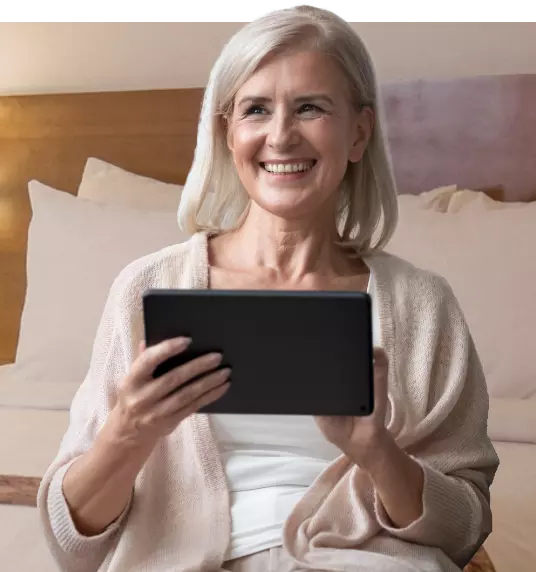 female tablet user in a hotel room